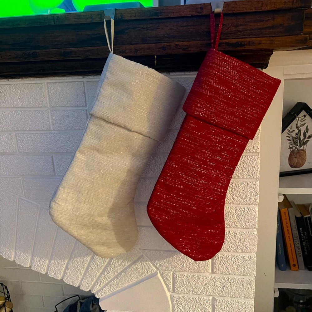 His and her Christmas stockings with holders.
